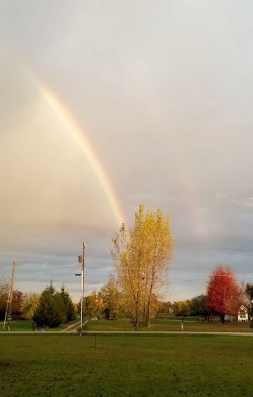 Rainbow across the road